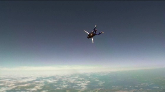 Another soldier takes part in the sky dive above Salisbury Plain.