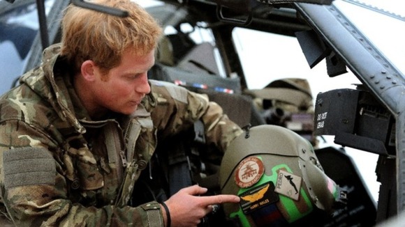 Harry surprised visitors at the annual Cosford Air Show yesterday by taking to the skies in an Apache helicopter.