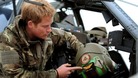 Harry surprised visitors at the annual Cosford Air Show yesterday by taking to the skies in an Apache helicopter.