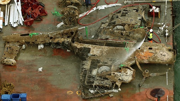 The remains of a crashed Dornier bomber on a barge near Deal.