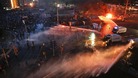 Water cannon are used to clear Taksim Square in central Istanbul