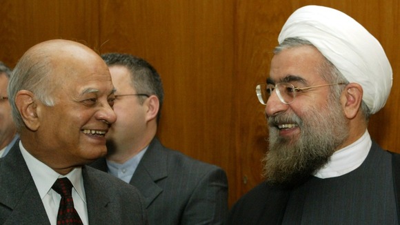 Hassan Rouhani (R) in a former guise as Iran's chief nuclear negotiator with India's national security advisor Brajesh Mishra