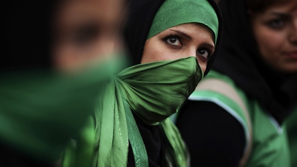 Supporters of presidential candidate Mir Hossein Mousavi wear green colours at a rally in Tehran in 2009