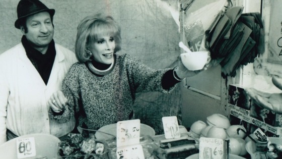 Joan Rivers helping out at the stall