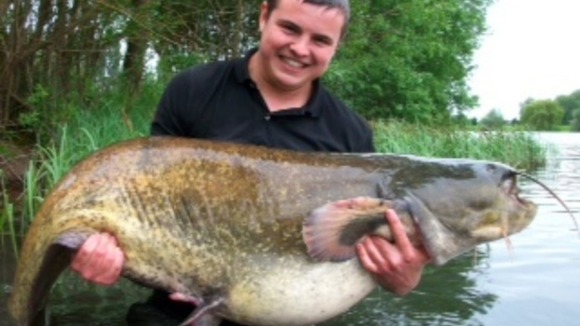 Daniel Sibley with his 8 stone fish in Northamptonshire.