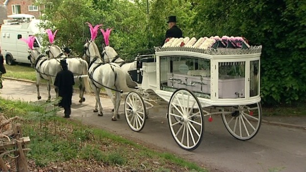 Coffin outside the church