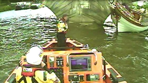 The barge collided with Kew road bridge late yesterday afternoon.
