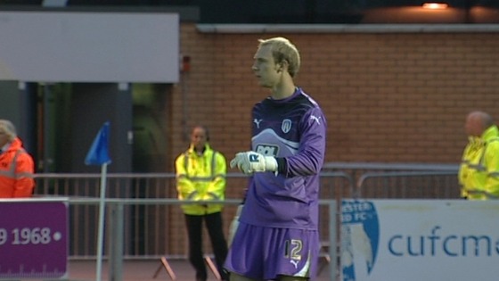 Mark Cousins has signed a new deal to stay at Colchester United