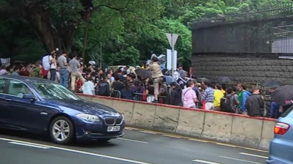 Dozens of protester gathered outside the US Embassy in Hong Kong.