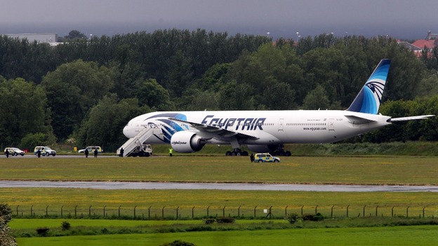 Police surround the Egyptair aircraft