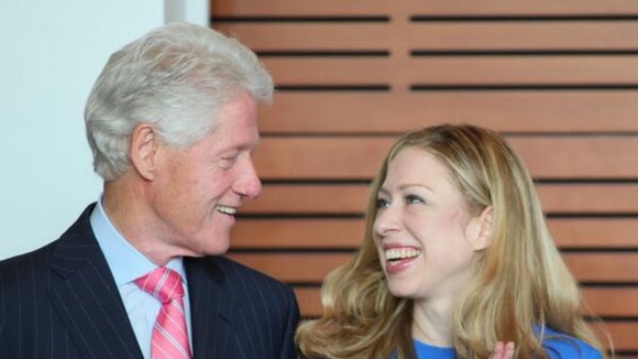 Former US President Bill Clinton with daughter Chelsea