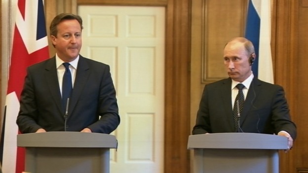 Prime Minister David Cameron speaks during a joint press conference with Russian President Vladimir Putin
