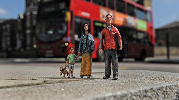 Syrian Refugees and a red cross worker