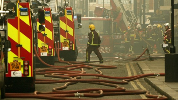 Firefighters tackle a blaze