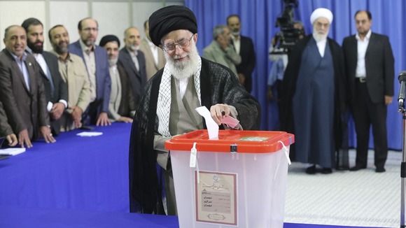Ayatollah Ali Khamenei casts his ballot in the election