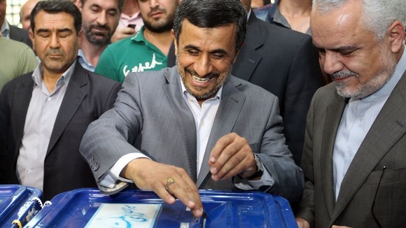 Mahmoud Ahmadinejad casting his ballot in the first round of the presidential elections