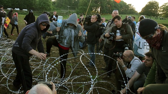G8 Protesters break through an outer fence during a protest near the G8 summit in Loch Erne, Enniskillen.