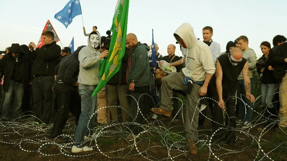 G8 Protesters break through an outer fence during a protest near the G8 summit in Loch Erne, Enniskillen.