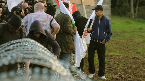 G8 Protesters break through an outer fence during a protest near the G8 summit in Loch Erne, Enniskillen.