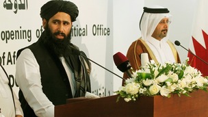 Muhammad Naeem (left) spokesman for the Office of the Taliban speaks during the opening of the Taliban Afghanistan Political Office in Doha.