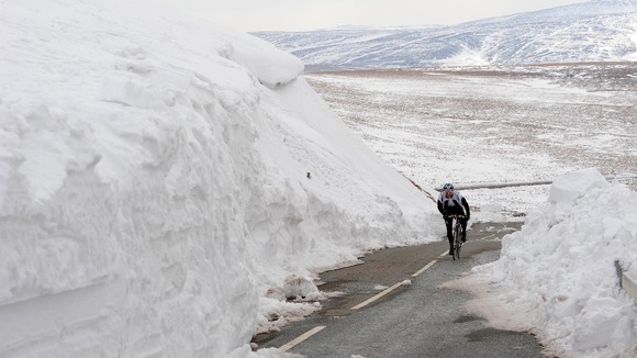 A cyclist near Holme Moss on the edge of the Peak District National Park.