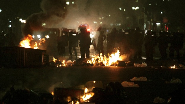 Riot police face off against demonstrators in Sao Paulo, Brazil on Tuesday night