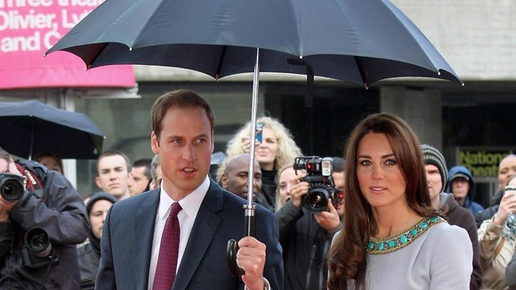 William and Kate braved the wet weather to attend the screening.