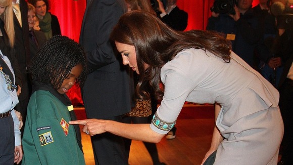 The Duchess of Cambridge talks to children as she arrives at the African Cats UK film premiere held at the BFI Southbank, London.