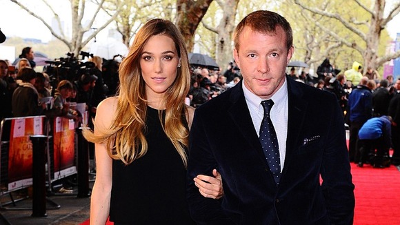 Guy Ritchie and Jacqui Ainsley arrive at the film screening.