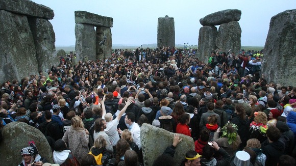 Crowds gather at Stonehenge in Wiltshire for the summer solstice