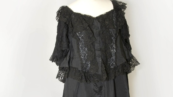 Gown of black silk worn by Queen Victoria.