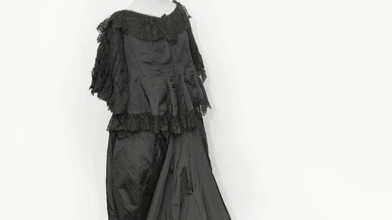 Gown of black silk worn by Queen Victoria.