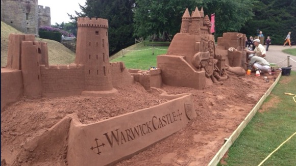 A sand sculptor has created two 10-tonne sandcastles at Warwick Castle.