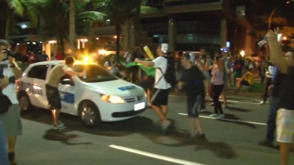 Security guards and police officers confronted protesters but decided not to interfere