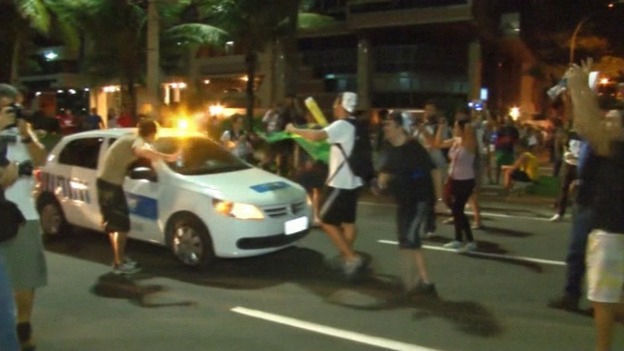 Security guards and police officers confronted protesters but decided not to interfere