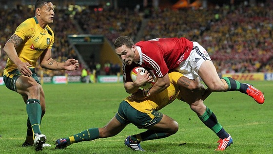 George North is tackled during the match against Australia