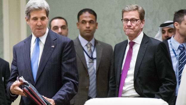 US Secretary of State John Kerry and German Foreign Minister Guido Westerwelle arrive for the Friends of Syria meeting in Doha, Qatar.