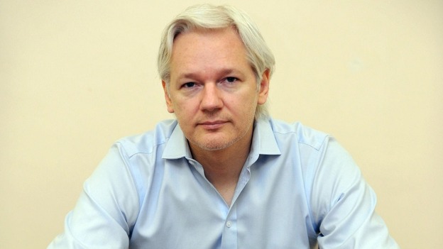 Julian Assange speaks to the media inside the Ecuadorian Embassy in London