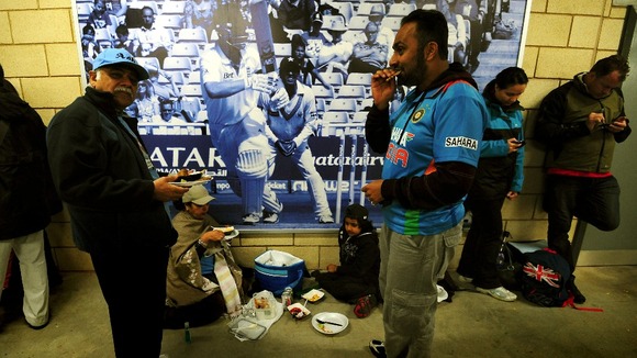 Fans have taken shelter in doors away from the wet weather