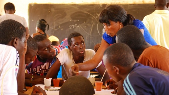 Sister Fa, a musician who is supported by the charity gives a class on female genital mutilation