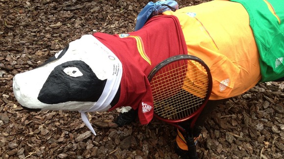 Concrete cows dressed up for Wimbledon fortnight