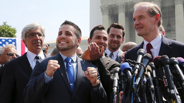 Jeff Zarrillo (2nd left) and Paul Katami (3rd left) and their lawyers announce the decision outside the Supreme Court in Washington.