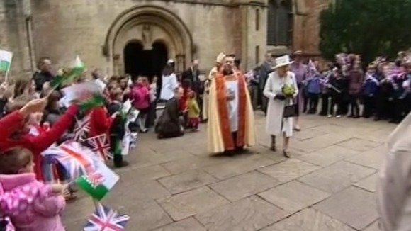 Queen walking pout of Cathedral
