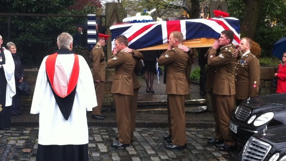 Corporal Jack Stanley's coffin leaves church for a private cremation