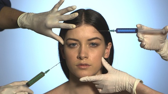 Lady poised for injections into face