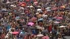 Thousands of people gathered in the rain to sing 'Children of the Rainbow' outside Breivik's courtroom.
