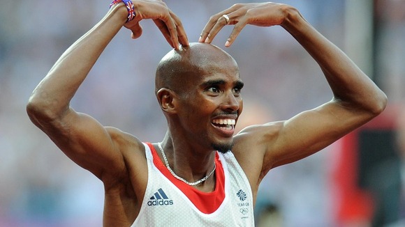 Mo Farah celebrates winning the Men's 5,000m Final