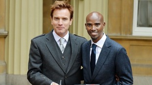 Ewan McGregor and Mo Farah show off their honours outside Buckingham Palace.