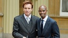 Ewan McGregor and Mo Farah show off their honours outside Buckingham Palace.