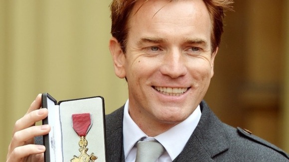 Ewan McGregor shows off his OBE and praised the work of the volunteers at Unicef and GoCampaign